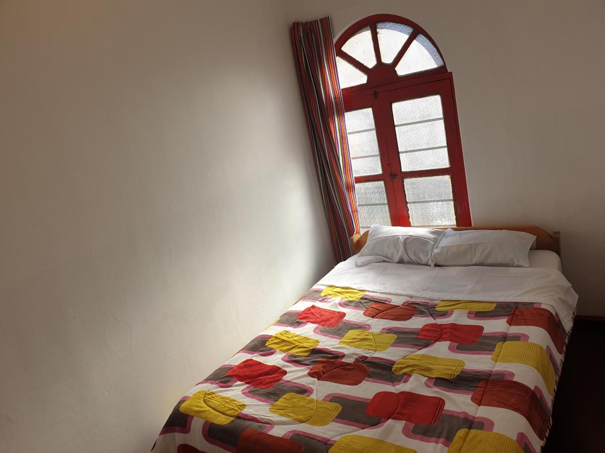 Sk Hostal Cuzco Habitación foto